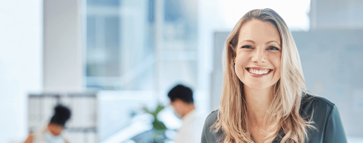 America Loves MBAs - Woman smiling at the camera