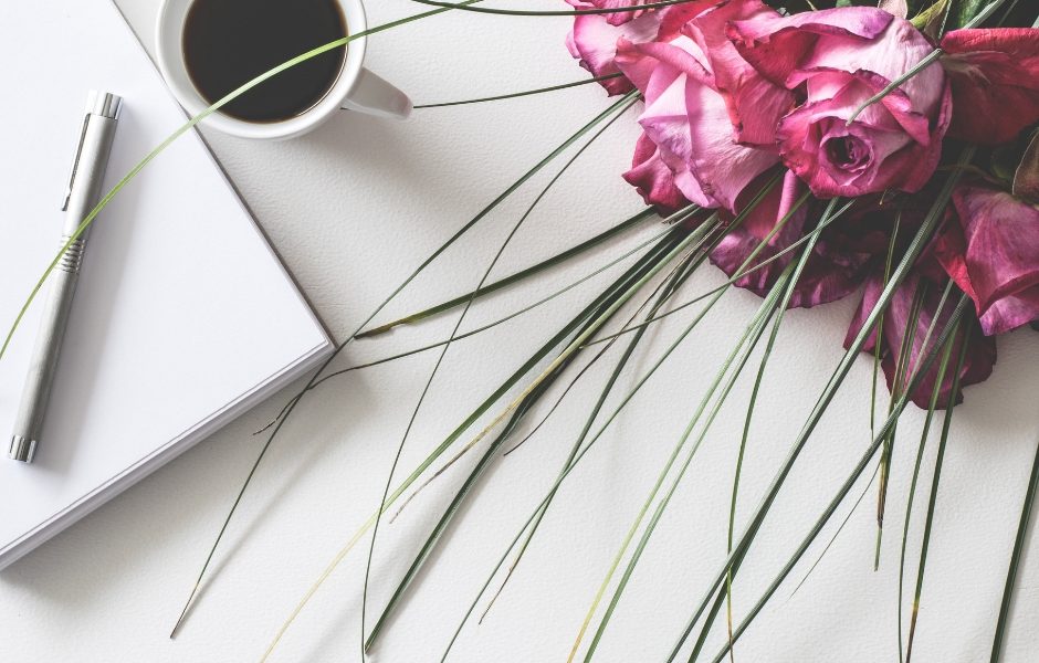 notepad with flowers on a table