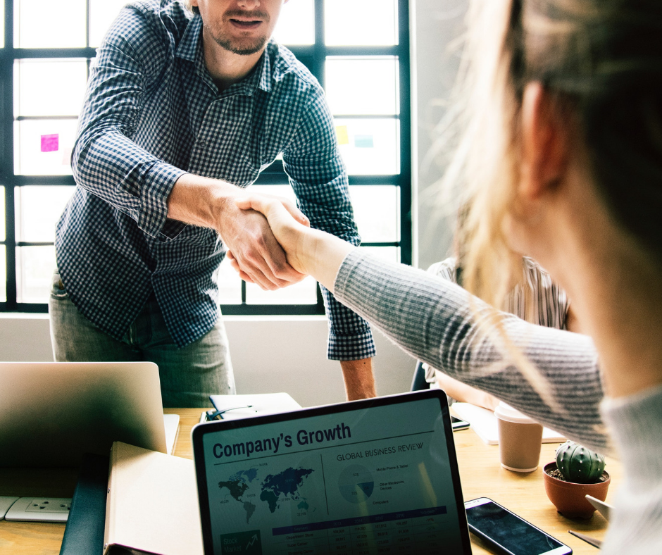 Man and woman shaking hands