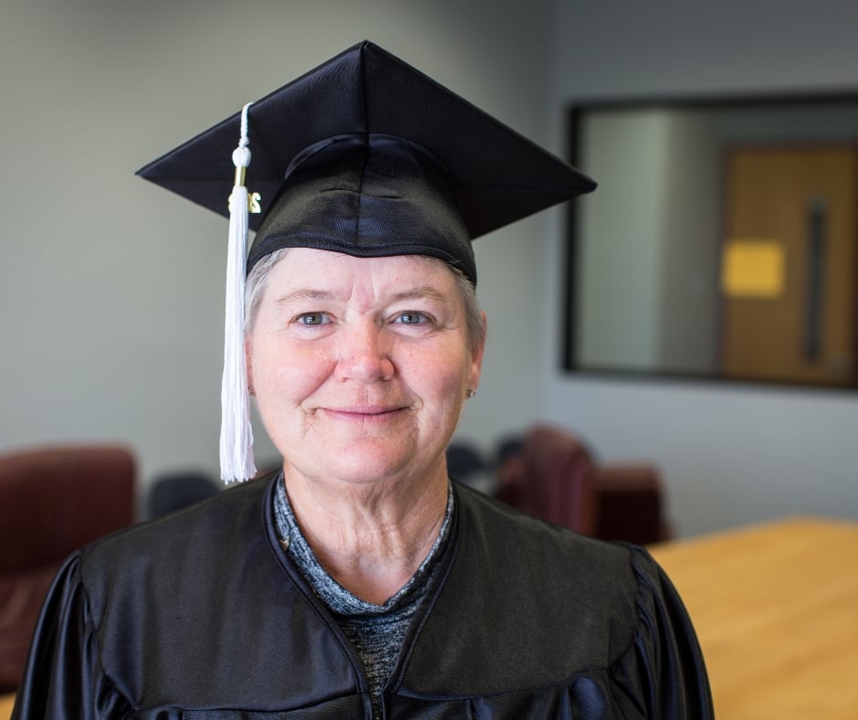 graduate smiling