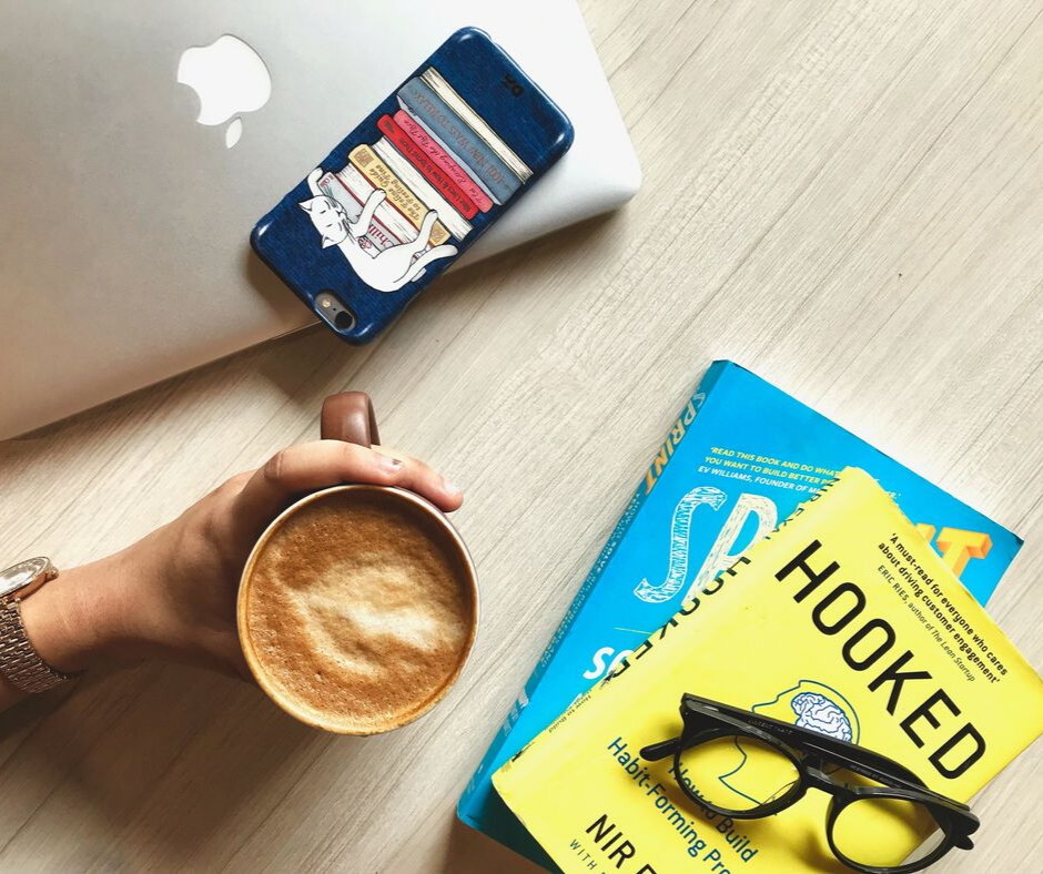 coffee cup and books