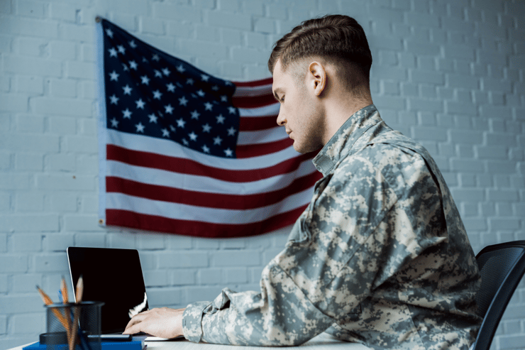 military man at computer