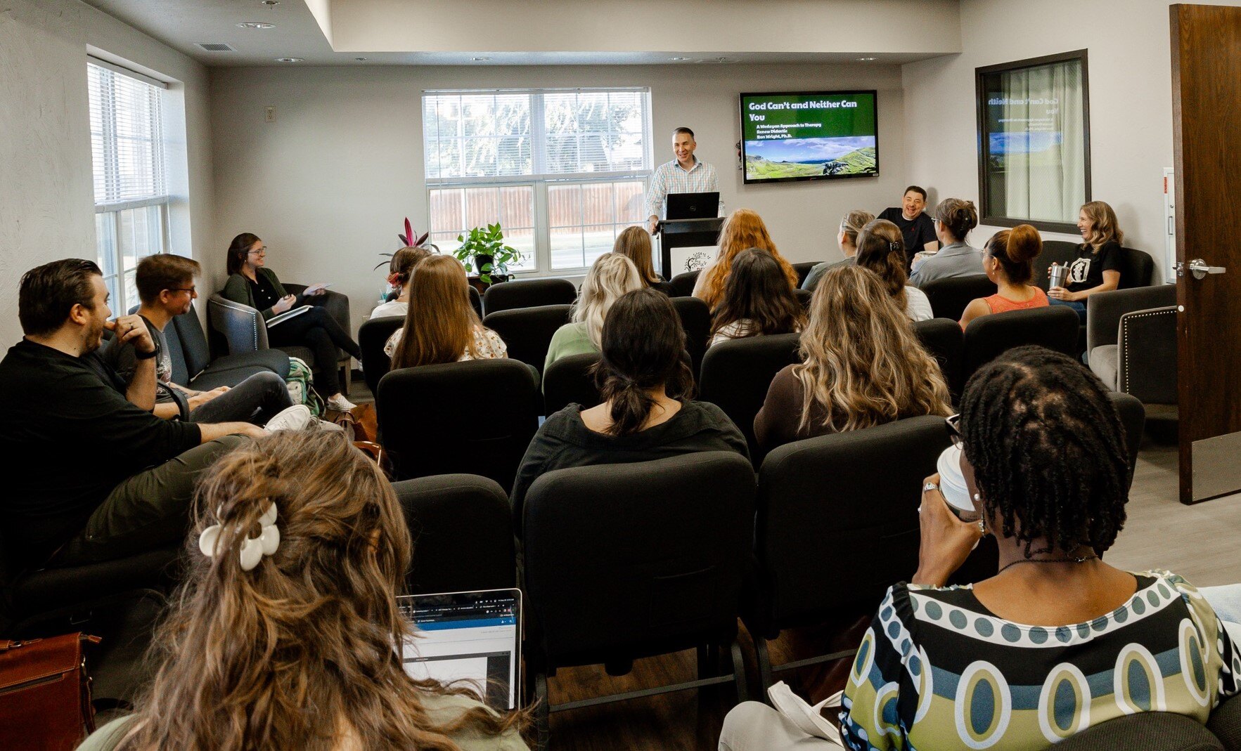 Dr. Scott Secor speaks to a group of students at Renew.