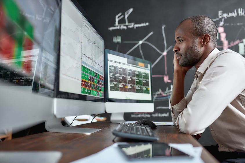 SNU Information Systems and Technology graduate at work on his computer