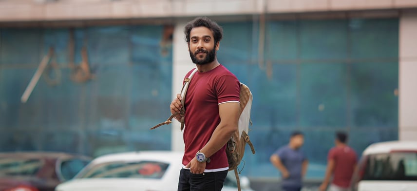 Student going home after classes image near college campus